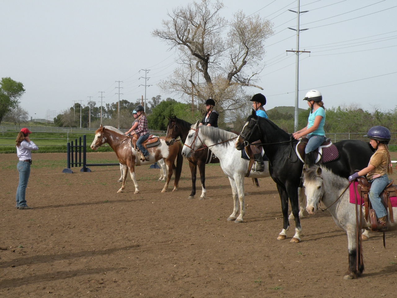 Young girl riding horseback